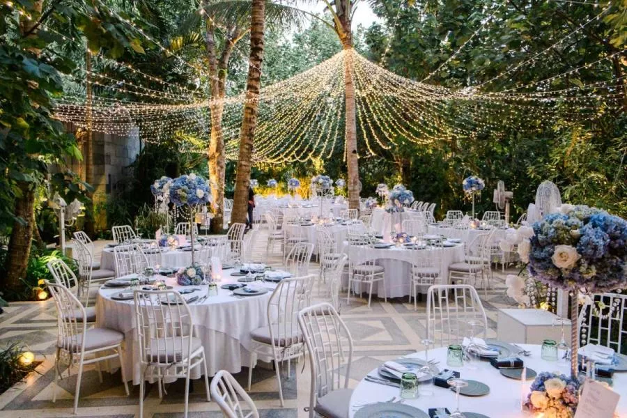 Decorations for the wedding reception at our wedding venue, the Glass House, nestled in the heart of Bali's lush woods, create a magical ambiance