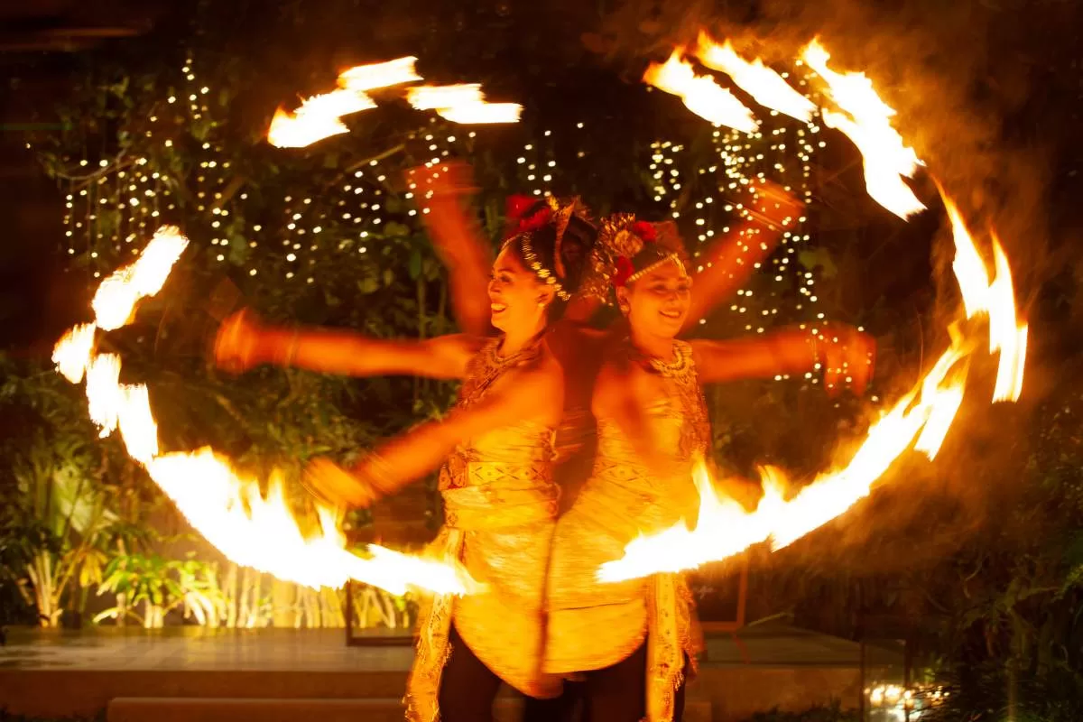 The dynamic fire dance keeps your guests entertained during your wedding reception dinner in Bali