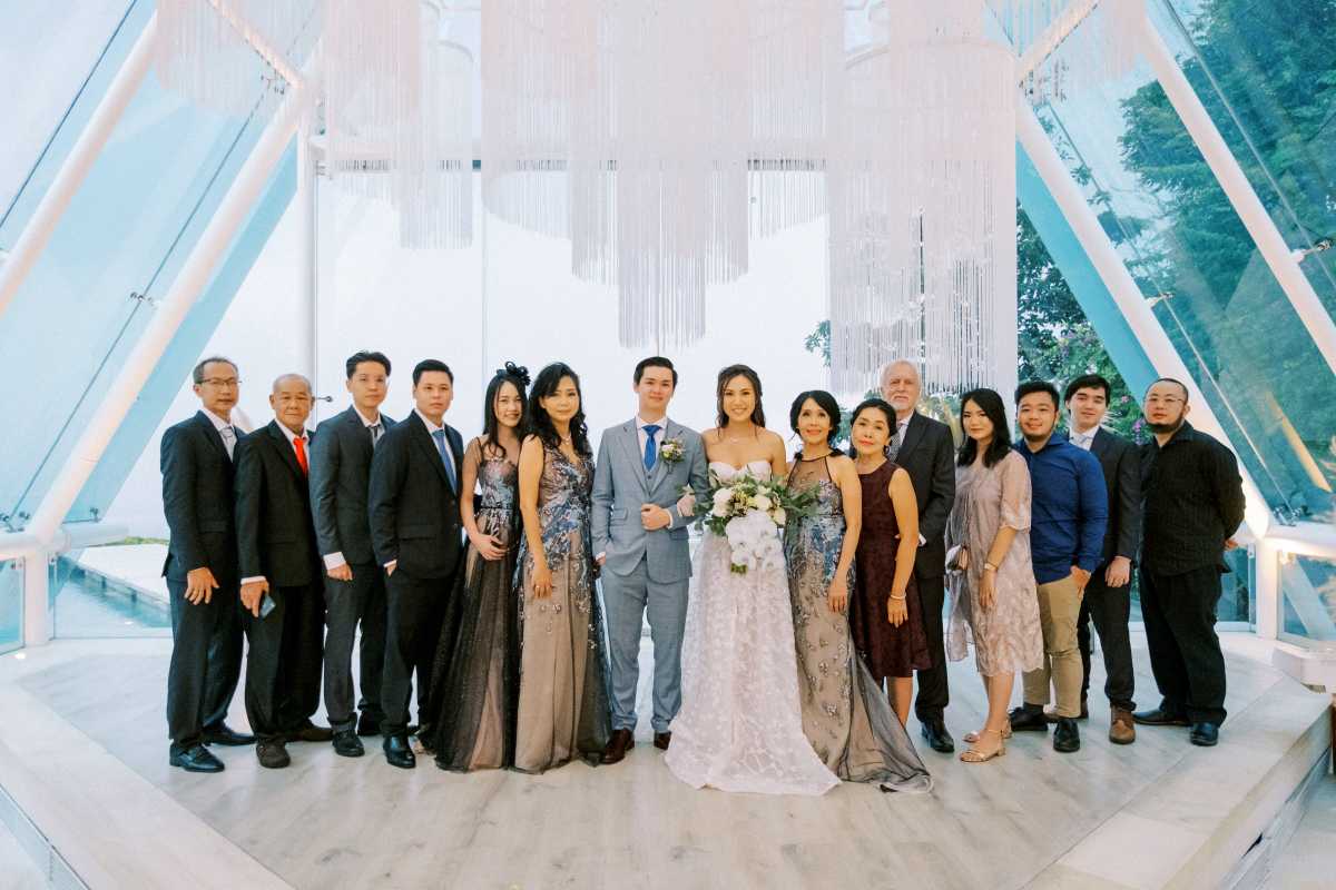 Group photo at Tirtha Uluwatu's iconic glass chapel