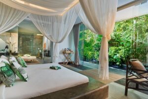the master bedroom at glass house, one of tirtha bali's exclusive bali wedding venues