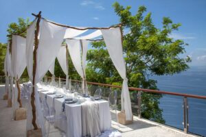 the open terrace, tirtha bali's wedding reception venue at tirtha uluwatu, one of the best wedding venues in bali