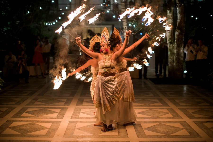 The dynamic fire dance keeps your guests entertained during your wedding reception dinner in Bali