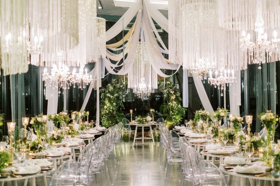 Tassels & Chandeliers for a dramatic wedding reception venue decoration