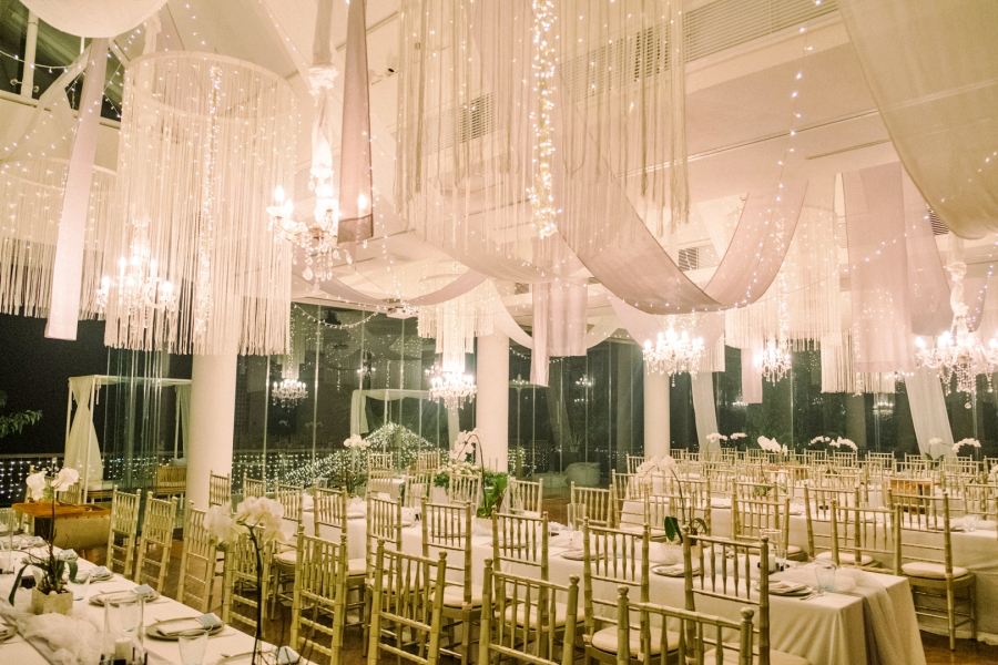 assels and chandeliers for a gorgeous look that enhances the entire reception venue
