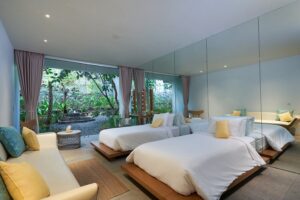 the guest bedroom at glass house, one of tirtha bali's exclusive bali wedding venues