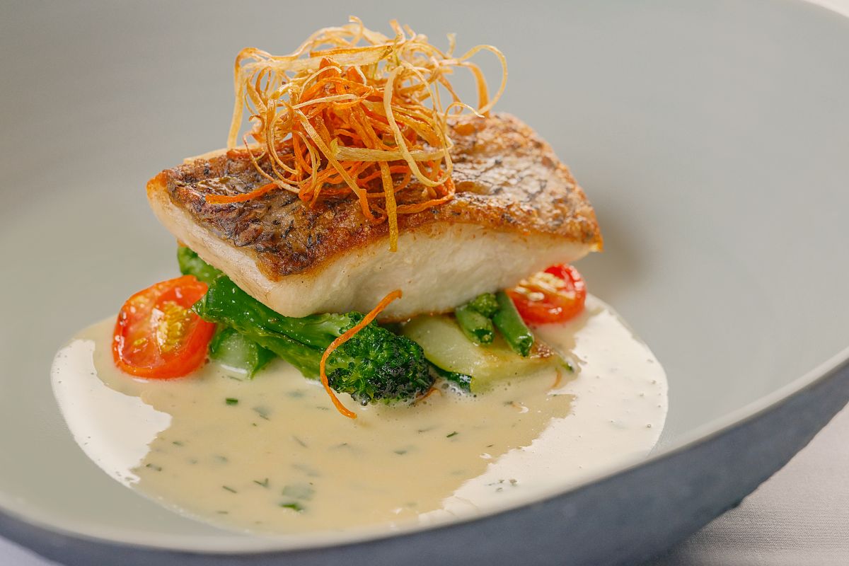 Pan fried Fish of the day in Champagne Beurre blanc sauce