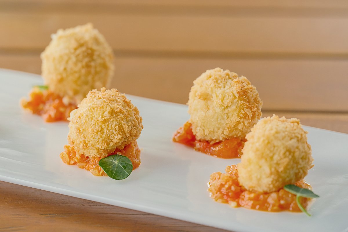 Enjoy King Crab Cream Croquette with Tomato Sauce at stunning wedding venues in Bali