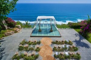 Glass Stage at Tirtha Uluwatu, set against the Indian Ocean offers an enchanting, almost surreal ambiance for your Bali destination wedding