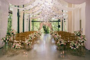 The Plumeria Room, a serene sanctuary enveloped in a forest setting, this Bali wedding venue evokes a perfectly intimate ambiance, surrounded by vibrant emerald greenery