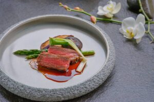 Wedding planning at Tirtha Bali includes a refined Celebration Menu experience.