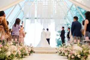 Bride and groom during a chapel wedding ceremony in Bali at Tirtha Uluwatu.