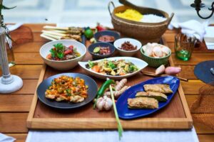 Traditional Indonesian cuisines served family style for a welcome dinner in Bali.