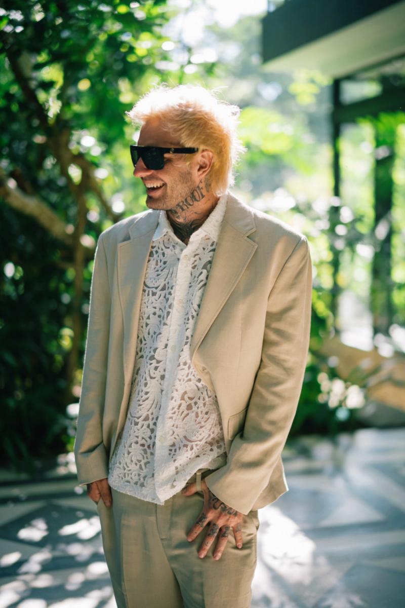 Michaljon smiles beneath the Bali sun, captured in a quiet groom moment at Tirtha.