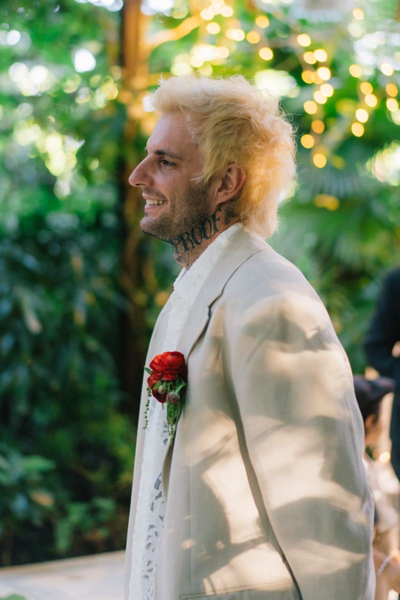Michaljon smiles as he awaits Akari during their wedding ceremony at Tirtha.