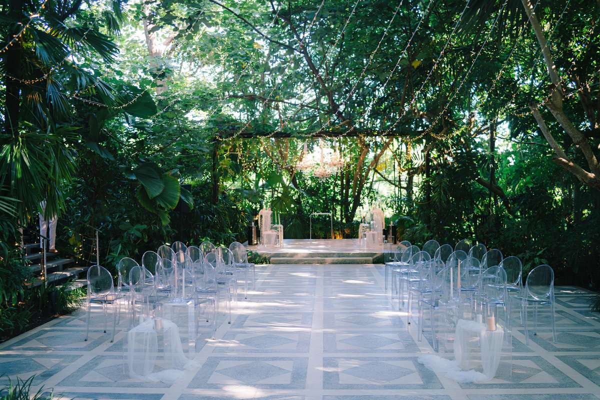 The ceremony setup at Moonlight Garden, a wedding venue nestled within the Glass House by Tirtha Bali.