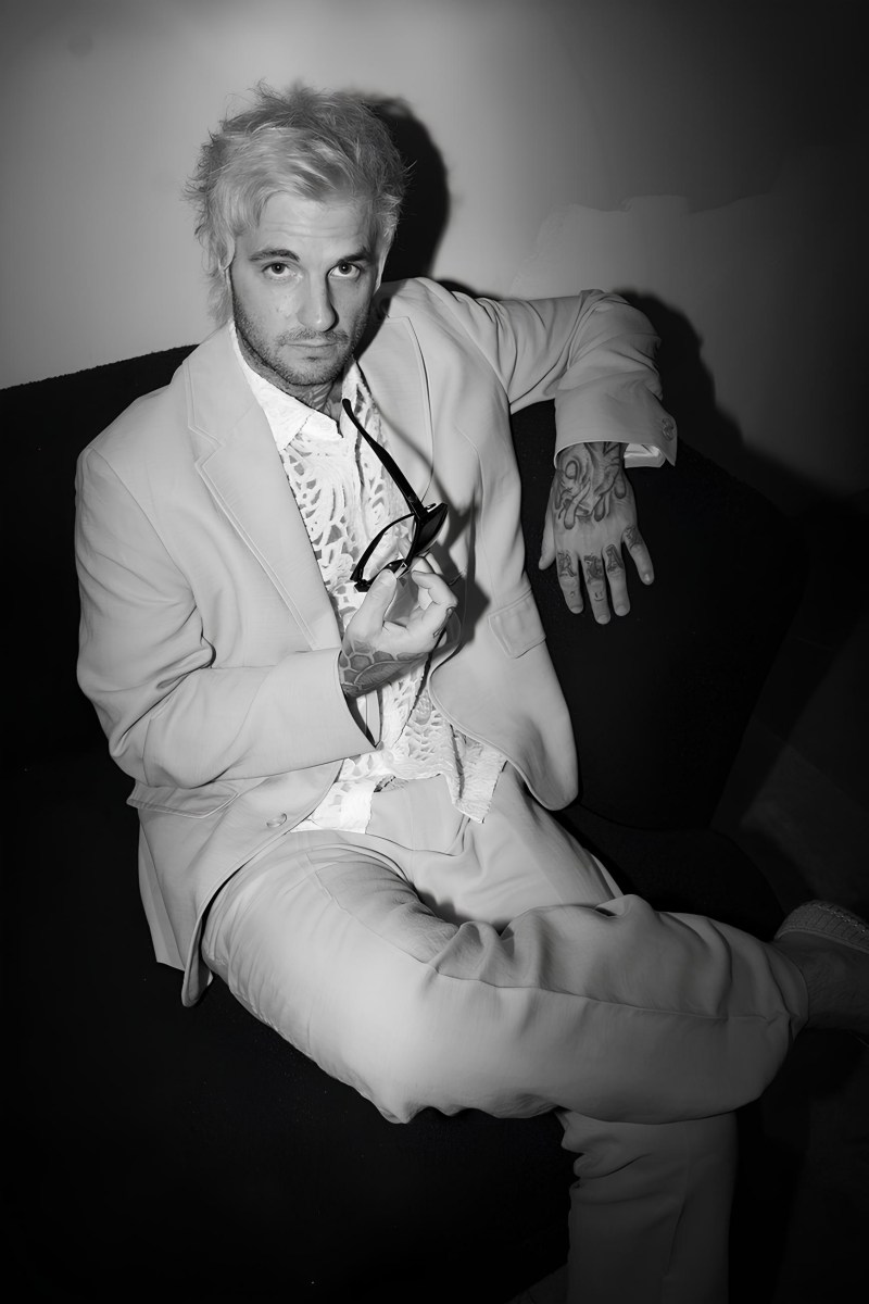 Michaljon in a quiet groom’s portrait, exuding effortless style.