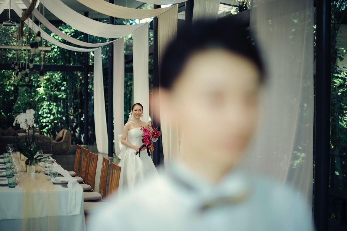 Bride walking to groom for first look at the Plumeria Room.