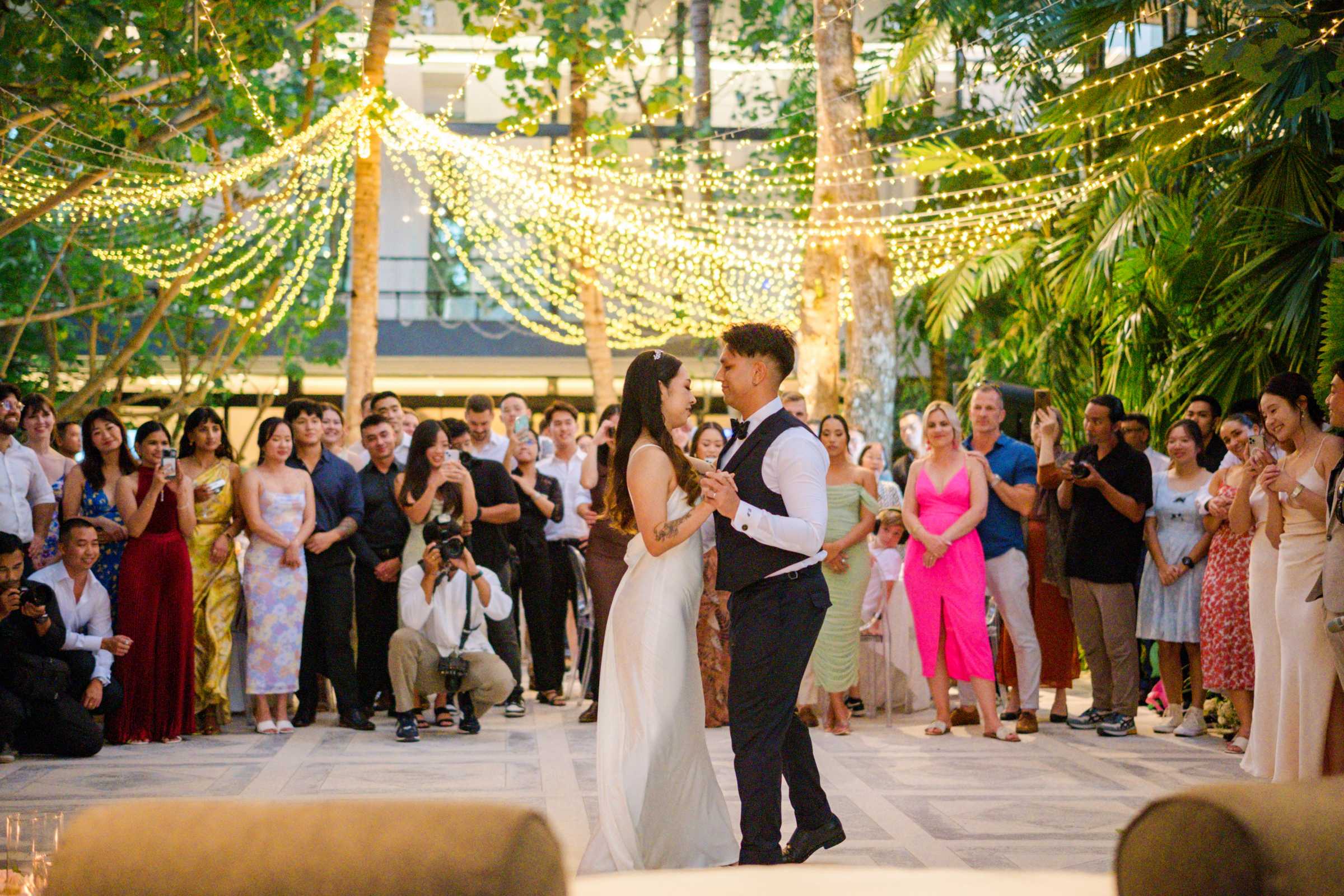 First dance at The Glass House by Tirtha Bali, a romantic garden wedding venue.