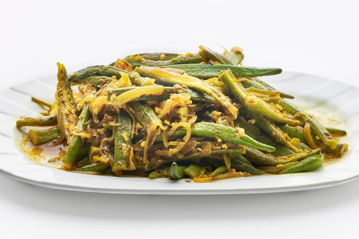 Bhindi masala with sautéed okra and onions coated in spiced masala.